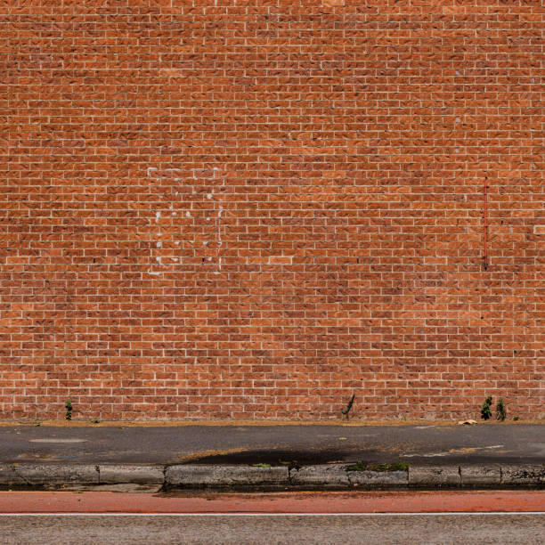 istock Part of a large orange and red brick wall 1440882911