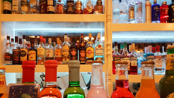 istock drinks on bar bottles bottle with many colors lights in the night 1440892392