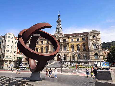 Monument in front of the Baroque style City Hall of Bilbao, Spain.\nThe building was built in 1892 by Joaquín Rucoba, on the former site of a convent in the district of Uribarri.
