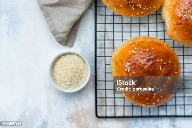 Round Buns With Sesame Seeds Bread Rolls Tasty Homemade Burger Bread With Sesame Concrete Background Freshly Baked Hamburger Buns Top View Stock Photo - Download Image Now