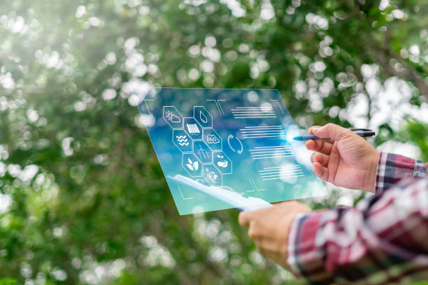Farming with modern technology concept on virtual screen and icon,The farmer checks the information of the framing from the document.Data analysis for sustainable agriculture development