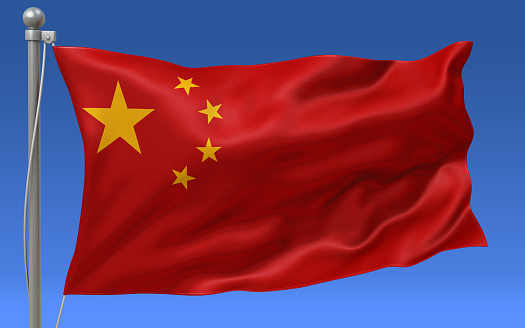 China flag waving on the flagpole on a sky background