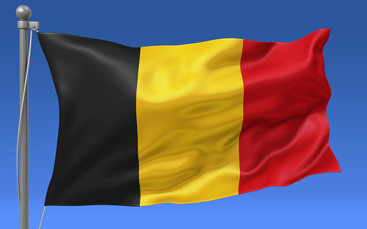 Belgium flag waving on the flagpole on a sky background