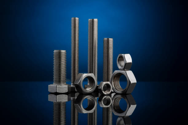 stainless steel fasteners nuts and bolts for different industrial applications - fastening imagens e fotografias de stock