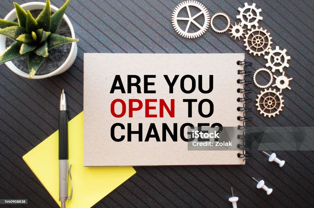 A sheet of paper with the inscription is attached to the rope with clothespins - ARE YOU OPEN TO CHANGE Business and education concept. A sheet of paper with the inscription is attached to the rope with clothespins - ARE YOU OPEN TO CHANGE. Adaptation - Concept Stock Photo