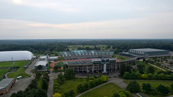 Ypsilanti, Michigan USA - July 15, 2021: Aerial view of Eastern Michigan University’s Football, Baseball, Tennis and Basketball complexes.