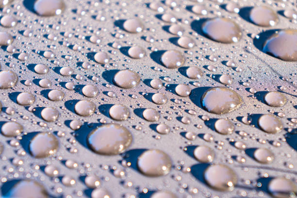 istock Shiny water drops on metallic surface. Water drops texture background. 1440910061