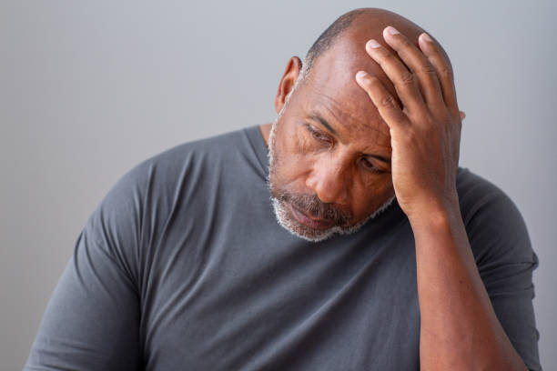 istock Older man not feeling well and having a headache. 1440914969