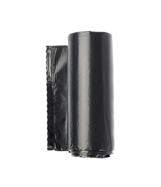 istock Garbage Bag Roll Isolated. Trash Package, New Rolled Plastic Bin Bags, Black Polyethylene Waste Container 1440915402
