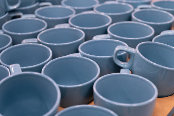 istock Stacks of Clean Mugs at Hotel Breakfast Buffet, White Cups 1440915457