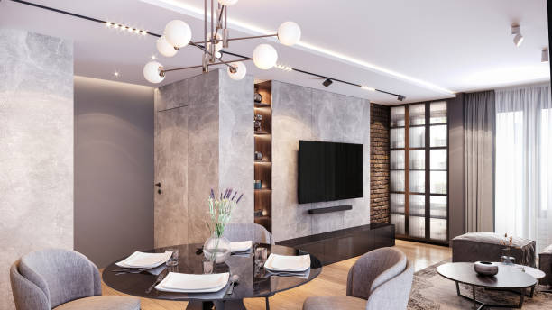 istock Dining table with armchairs in modern loft apartment 1440915609