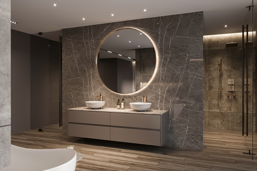 White towels and large window give a light feel to this bathroom