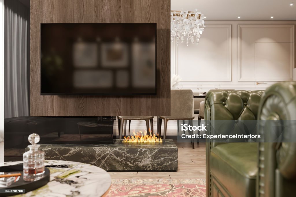 Luxury open plan living room interior with large TV on the wall and fireplace Luxury open plan apartment interior. Leather armchair, coffee table, TV set, wooden wall, fireplace, window with curtain, parquet and dining room in the background. Template for copy space. Render. Apartment Stock Photo