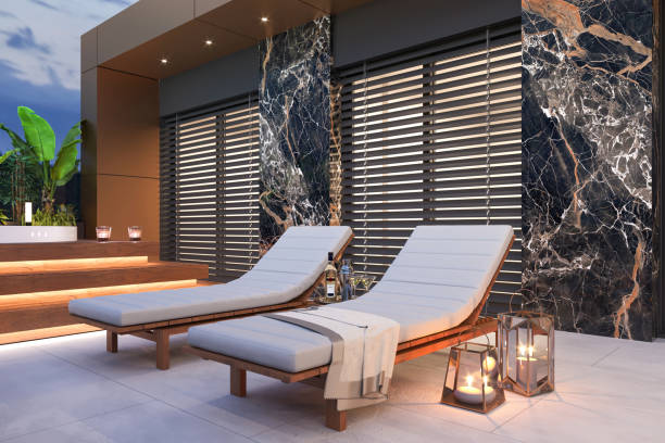 Luxury apartment terrace Luxury apartment terrace. Deck chairs, candles, marble walls, LED light, plant, sky. Template for copy space. Render. streaky lights stock pictures, royalty-free photos & images