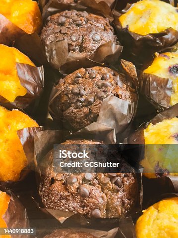 istock Freshly baked chocolate and vanilla muffins 1440918883