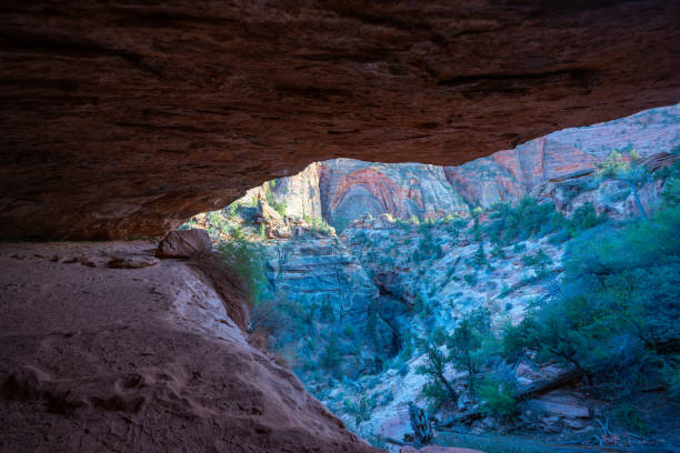 Looking out from a cave in the Zion National Park, Utah, USA, a day in the spring.