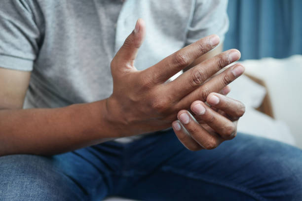 istock man suffering pain in hand close up 1440920402