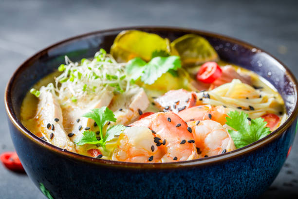 istock Tasty Malaysian Soup with prawns and chicken. 1440921409
