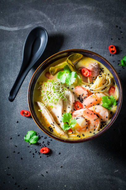 istock Yummy Malaysian Soup with prawns and chicken. 1440921422