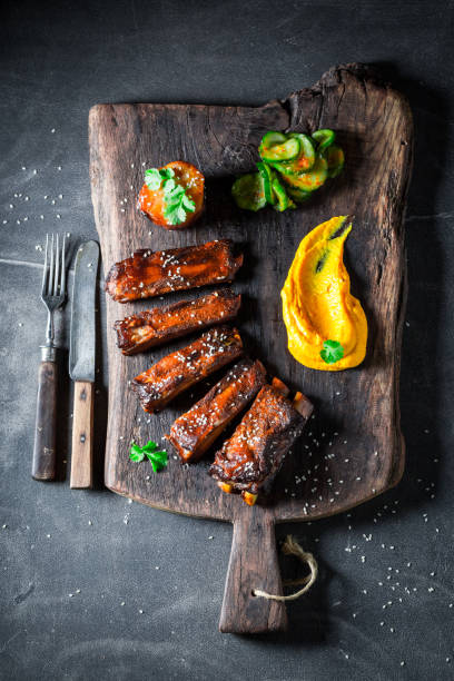 istock Hot and spicy roasted ribs marinated in red sauce. 1440921640
