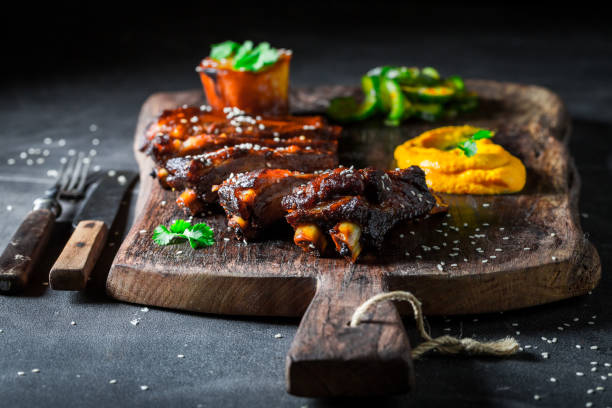 Delicious and aromatic roasted ribs with vegetables and sesame.