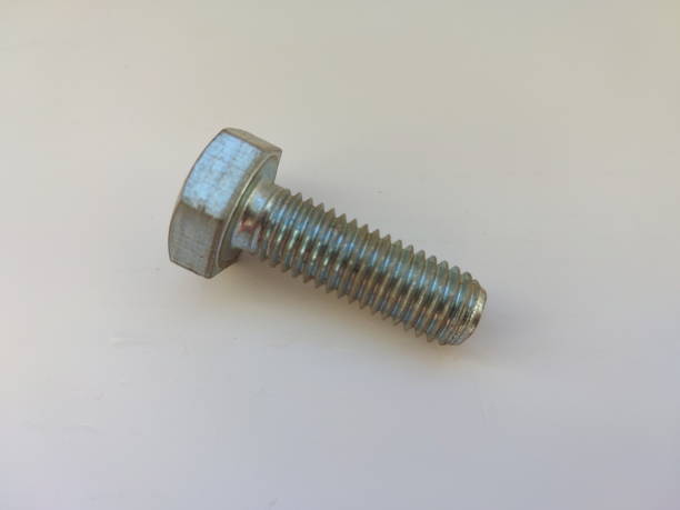 Metal bolts, screws and washers stock photo