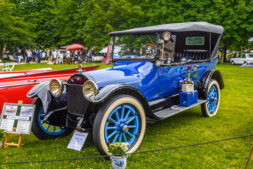 Baden-Baden, Germany - 14 July 2019: blue black Buick K Six Open Tourer 1920 cabrio roadster is parked in Kurpark in Baden-Baden at the exhibition of old cars \