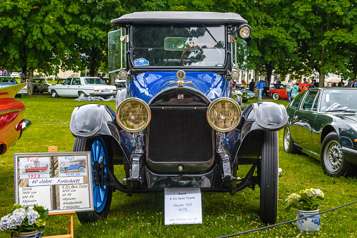 Baden-Baden, Germany - 14 July 2019: blue black Buick K Six Open Tourer 1920 cabrio roadster is parked in Kurpark in Baden-Baden at the exhibition of old cars \