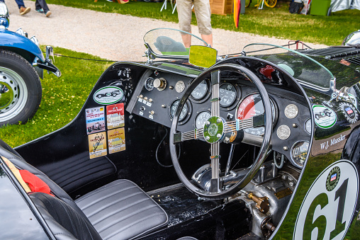 Baden-Baden, Germany - 14 July 2019: leather black interior of black Morris MG J-Type J4 Midget cabrio roadster 1932 1934 which is parked in Kurpark in Baden-Baden at the exhibition of old cars 
