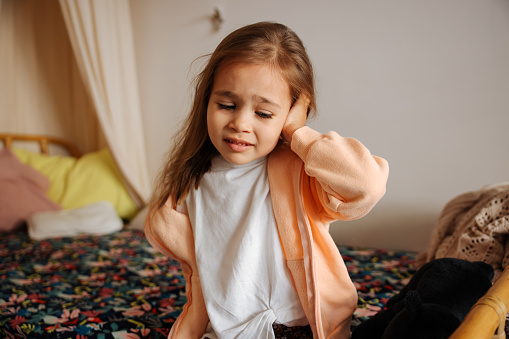 Little girl having an earache