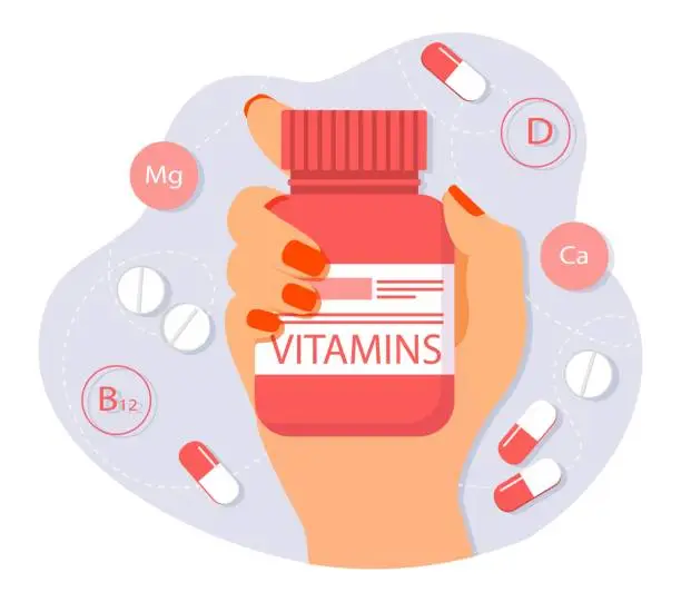 Vector illustration of Hand holding vitamins