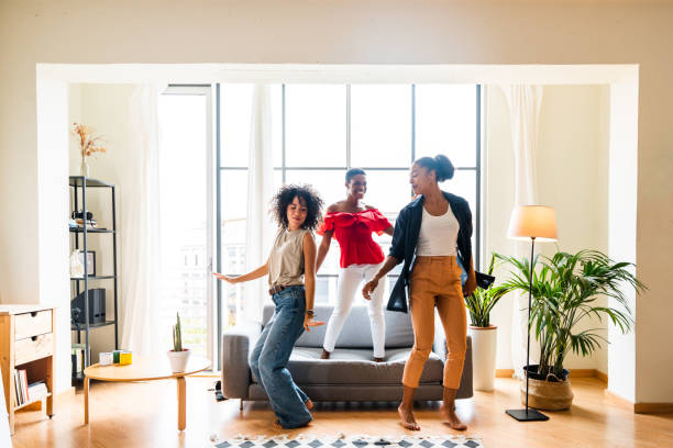istock Three mixed race hispanic and black women bonding at home 1440927626