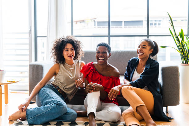 istock Three mixed race hispanic and black women bonding at home 1440928665