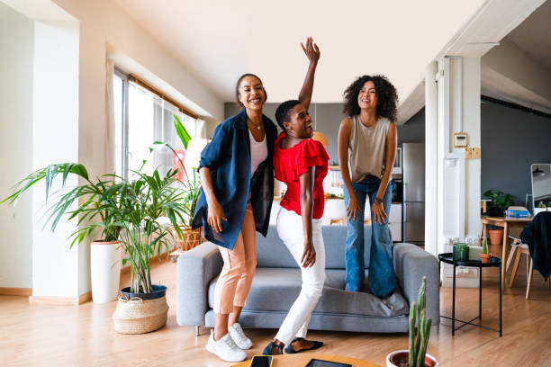 istock Three mixed race hispanic and black women bonding at home 1440928679