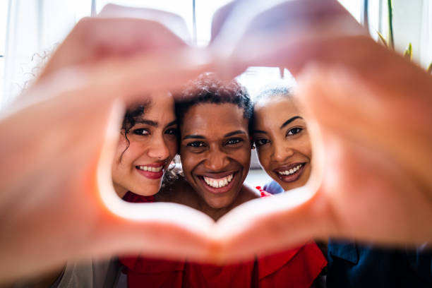 istock Three mixed race hispanic and black women bonding at home 1440930400
