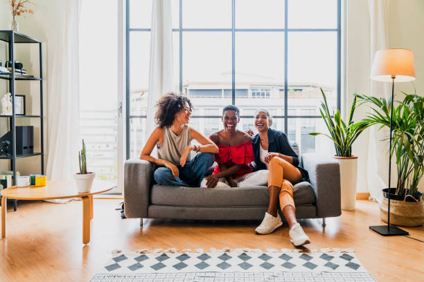 istock Three mixed race hispanic and black women bonding at home 1440931239
