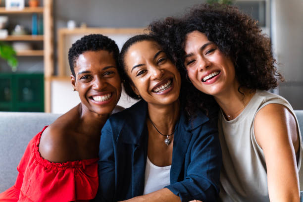 istock Three mixed race hispanic and black women bonding at home 1440931334