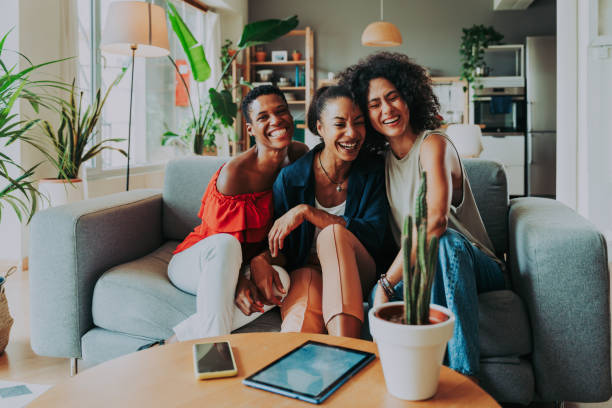 istock Three mixed race hispanic and black women bonding at home 1440931497