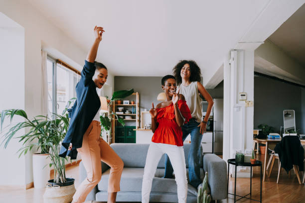 istock Three mixed race hispanic and black women bonding at home 1440931584
