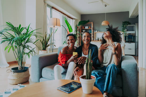 istock Three mixed race hispanic and black women bonding at home 1440931658