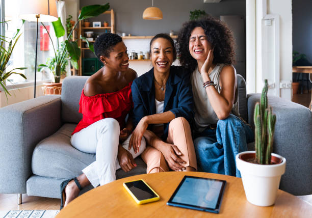 istock Three mixed race hispanic and black women bonding at home 1440931682