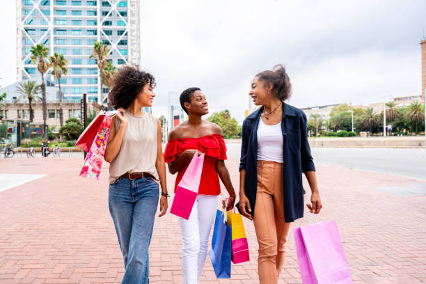 istock Three mixed race hispanic and black women bonding outdoors 1440932898