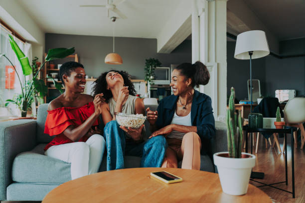 istock Three mixed race hispanic and black women bonding at home 1440932964