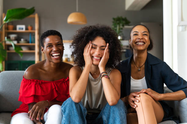 istock Three mixed race hispanic and black women bonding at home 1440932990