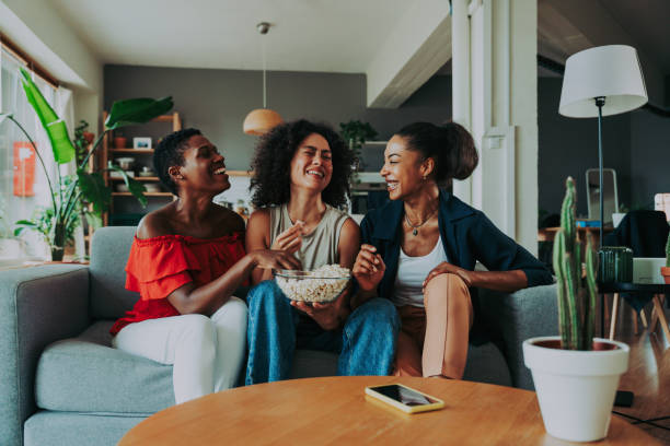 istock Three mixed race hispanic and black women bonding at home 1440933061