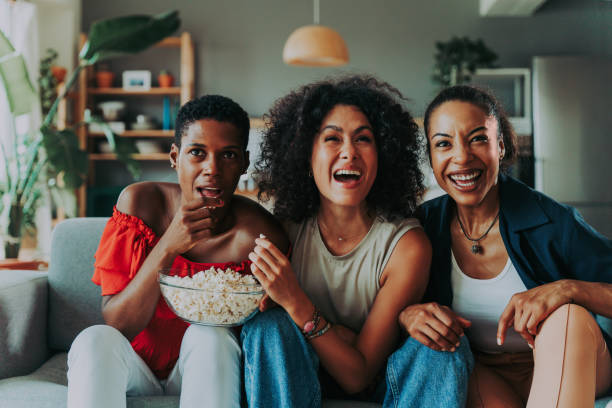 istock Three mixed race hispanic and black women bonding at home 1440933083