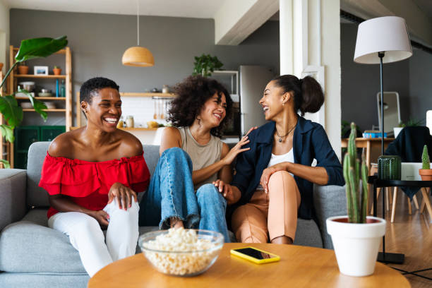 istock Three mixed race hispanic and black women bonding at home 1440933652