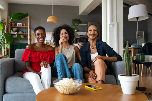 istock Three mixed race hispanic and black women bonding at home 1440933829