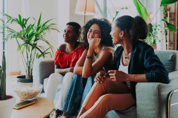 istock Three mixed race hispanic and black women bonding at home 1440934024