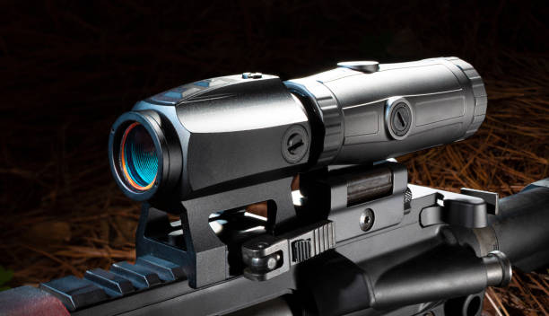 istock Magnifier behind a red dot sight on an assault rifle 1440934221